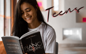 Image or a teenager reading with the word Teen as the identifier